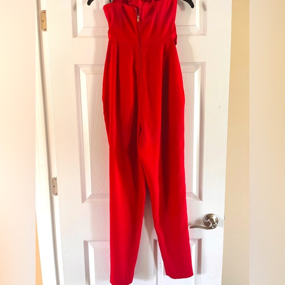 RED HOT Bebe Strapless Jumpsuit - Picture 5 of 7